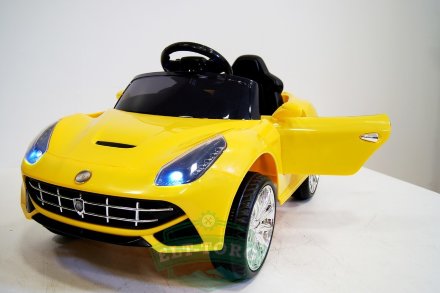 Электромобиль RiverToys Ferrari O222OO-YELLOW-LEATHER