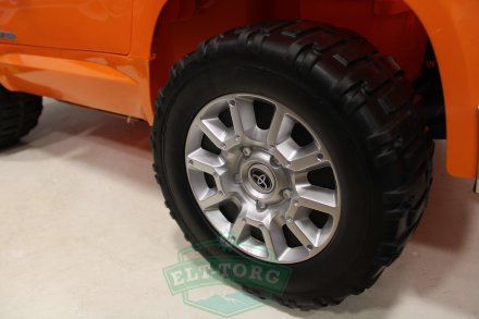 Детский электромобиль TOYOTA TUNDRA JJ2255 оранжевый (ЛИЦЕНЗИОННАЯ МОДЕЛЬ)
